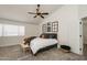 Bright bedroom featuring a comfortable bed and stylish decor at 6073 W Caribe Ln, Glendale, AZ 85306