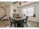 Cozy dining area near the entrance with a round table and four chairs, creating a welcoming space at 6073 W Caribe Ln, Glendale, AZ 85306