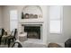 Modern fireplace with marble surround and decorative accents at 6073 W Caribe Ln, Glendale, AZ 85306