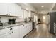 Modern kitchen with granite countertops and stainless steel appliances at 6073 W Caribe Ln, Glendale, AZ 85306