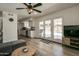 Living area with open concept kitchen and pool access at 6073 W Caribe Ln, Glendale, AZ 85306