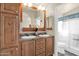 Bathroom with double vanity and shower stall at 650 N Hawes Rd # 3811, Mesa, AZ 85207