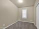 Simple bedroom with carpet and window shutters at 650 N Hawes Rd # 3811, Mesa, AZ 85207