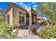 Landscaped backyard with patio furniture and desert plants at 6970 E Hibiscus Way, Scottsdale, AZ 85266