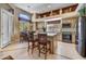 Island kitchen with granite counters and stainless steel appliances at 6970 E Hibiscus Way, Scottsdale, AZ 85266