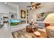 Gathering room with fireplace and built-in shelving at 6970 E Hibiscus Way, Scottsdale, AZ 85266