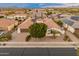 Aerial view of house, yard, pool and basketball court at 7556 W Crystal Rd, Glendale, AZ 85308