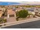 Aerial view of single-story house with solar panels and landscaped yard at 7556 W Crystal Rd, Glendale, AZ 85308