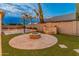 Backyard with fire pit and basketball court at 7556 W Crystal Rd, Glendale, AZ 85308