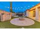 Backyard oasis with fire pit and spa at 7556 W Crystal Rd, Glendale, AZ 85308