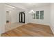 Elegant dining room with hardwood floors and a chandelier at 7556 W Crystal Rd, Glendale, AZ 85308