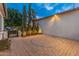 Landscaped front courtyard with brick pavers and a circular design at 7556 W Crystal Rd, Glendale, AZ 85308