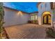 Elegant front entry with ornate double doors and brick pavers at 7556 W Crystal Rd, Glendale, AZ 85308