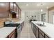 Modern kitchen with stainless steel appliances and island at 7556 W Crystal Rd, Glendale, AZ 85308