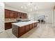 Modern kitchen featuring a large island and ample cabinetry at 7556 W Crystal Rd, Glendale, AZ 85308