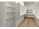 Large walk-in closet with plenty of shelving and hanging space at 7556 W Crystal Rd, Glendale, AZ 85308