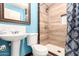 Bathroom with pedestal sink and shower stall at 8055 S 7Th St, Phoenix, AZ 85042