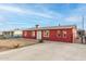 Newly renovated red house with driveway at 8055 S 7Th St, Phoenix, AZ 85042