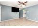 Living room with tile floors and a view of the kitchen at 8055 S 7Th St, Phoenix, AZ 85042