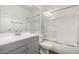 Clean bathroom with gray vanity and a tub shower combo at 8270 N Hayden Rd # 1023, Scottsdale, AZ 85258