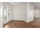 Bright entryway with terracotta floor and coat closet at 8270 N Hayden Rd # 1023, Scottsdale, AZ 85258