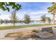 Scenic lake view with walking path and bench at 8270 N Hayden Rd # 1023, Scottsdale, AZ 85258