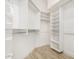 Large walk-in closet with ample shelving and hanging space at 8270 N Hayden Rd # 1023, Scottsdale, AZ 85258