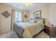 Bedroom with a double bed and nightstand at 11029 W Mountain View Dr, Avondale, AZ 85323