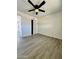 Light and airy bedroom with ceiling fan and closet at 11713 W River Rd, El Mirage, AZ 85335