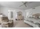 Relaxing bedroom with comfortable seating and a dresser at 12506 W Castle Rock Dr, Sun City West, AZ 85375