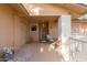 Inviting front entry with a walkway and potted plants at 12506 W Castle Rock Dr, Sun City West, AZ 85375