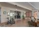 Bright sunroom with view into living room at 12506 W Castle Rock Dr, Sun City West, AZ 85375