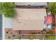 Overhead view of a home with a tile roof, spa, and backyard landscaping at 12522 W Llano Dr, Litchfield Park, AZ 85340