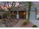 Front entry of two-story home with walkway and landscaping at 12522 W Llano Dr, Litchfield Park, AZ 85340