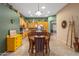 Well-equipped kitchen with granite island and light wood cabinetry at 12522 W Llano Dr, Litchfield Park, AZ 85340