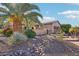 Single-story home with rock landscaping and a dry creek bed at 12911 W Eagle Ridge Ln, Peoria, AZ 85383