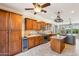 Kitchen with large island, stainless steel appliances, and abundant cabinets at 12911 W Eagle Ridge Ln, Peoria, AZ 85383