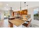 Spacious kitchen with island, wood cabinets and granite counters at 12911 W Eagle Ridge Ln, Peoria, AZ 85383