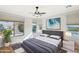 Relaxing main bedroom with large windows and wood flooring at 12911 W Eagle Ridge Ln, Peoria, AZ 85383