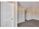 A bright bedroom features neutral walls and carpet at 13219 W Prospect Dr, Sun City West, AZ 85375