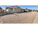 A charming single-story home features low maintenance desert landscaping at 13219 W Prospect Dr, Sun City West, AZ 85375