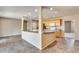 Bright, airy kitchen showcasing spacious countertops and ample storage in the well-lit cooking space at 13219 W Prospect Dr, Sun City West, AZ 85375