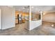 Open kitchen with stainless steel refrigerator and abundant cabinet space, seamlessly flowing into the dining area at 13219 W Prospect Dr, Sun City West, AZ 85375