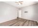 Simple bedroom with wood-look floors at 13257 W Watson Ln, Surprise, AZ 85379