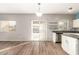 Kitchen dining area with sliding glass doors to backyard at 13257 W Watson Ln, Surprise, AZ 85379