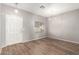 Entryway with wood-look floors, white door and a window at 13257 W Watson Ln, Surprise, AZ 85379