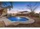 Inviting swimming pool at dusk, complete with a pergola at 13257 W Watson Ln, Surprise, AZ 85379