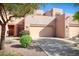 Two-story stucco home with attached garage and landscaping at 1404 W Weatherby Way, Chandler, AZ 85286