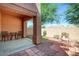 Private patio with seating area and small artificial lawn at 1404 W Weatherby Way, Chandler, AZ 85286