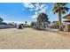 Sandy backyard with storage shed and trampoline at 1437 W Yukon Dr, Phoenix, AZ 85027